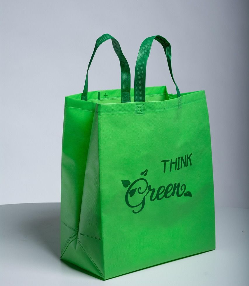 Green reusable shopping bag with