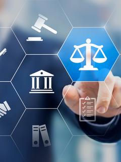 Person pointing to a scale of justice icon, surrounded by legal symbols.