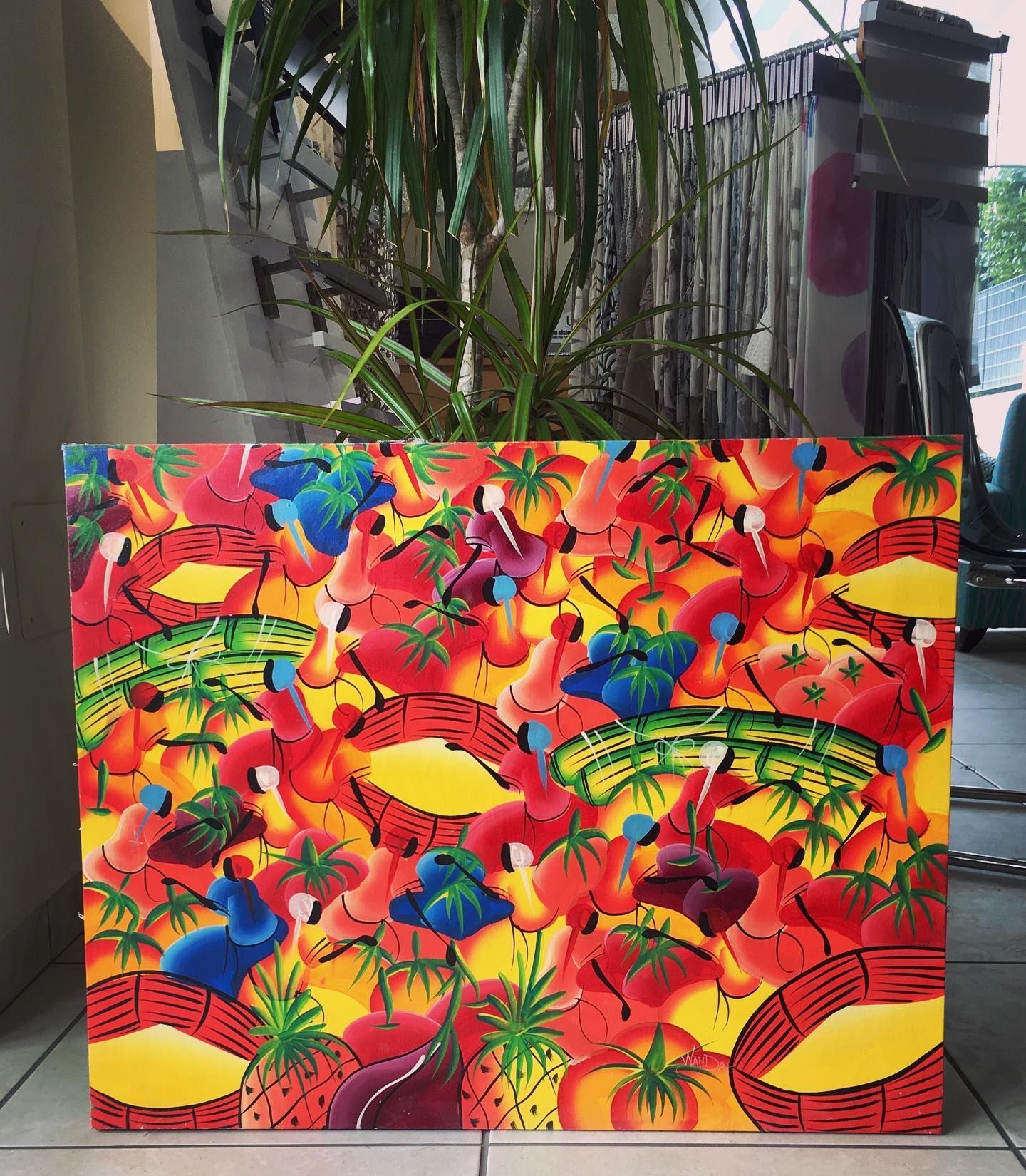 Un dipinto colorato di frutta e verdura su una tela