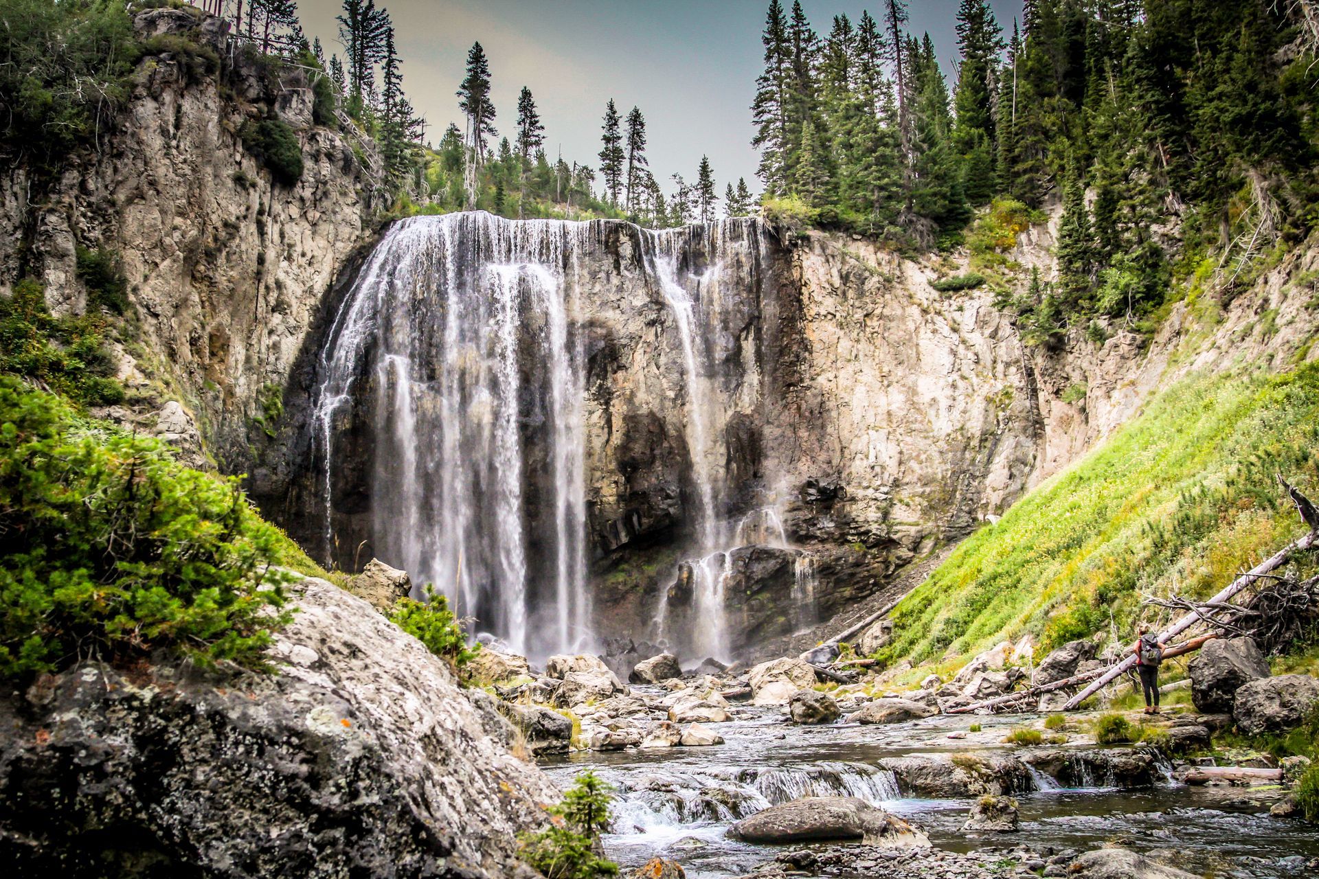 Long thin curtains of water cascade over Dunanda Falls near the Boundary Creek Trail in Southwest Yellowstone.