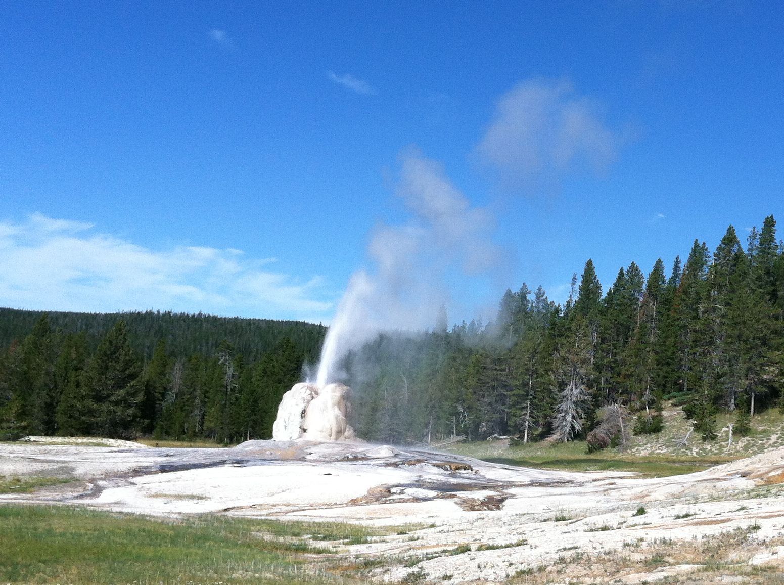 Lone Star Geyser begins its spectacular eruption cycle.