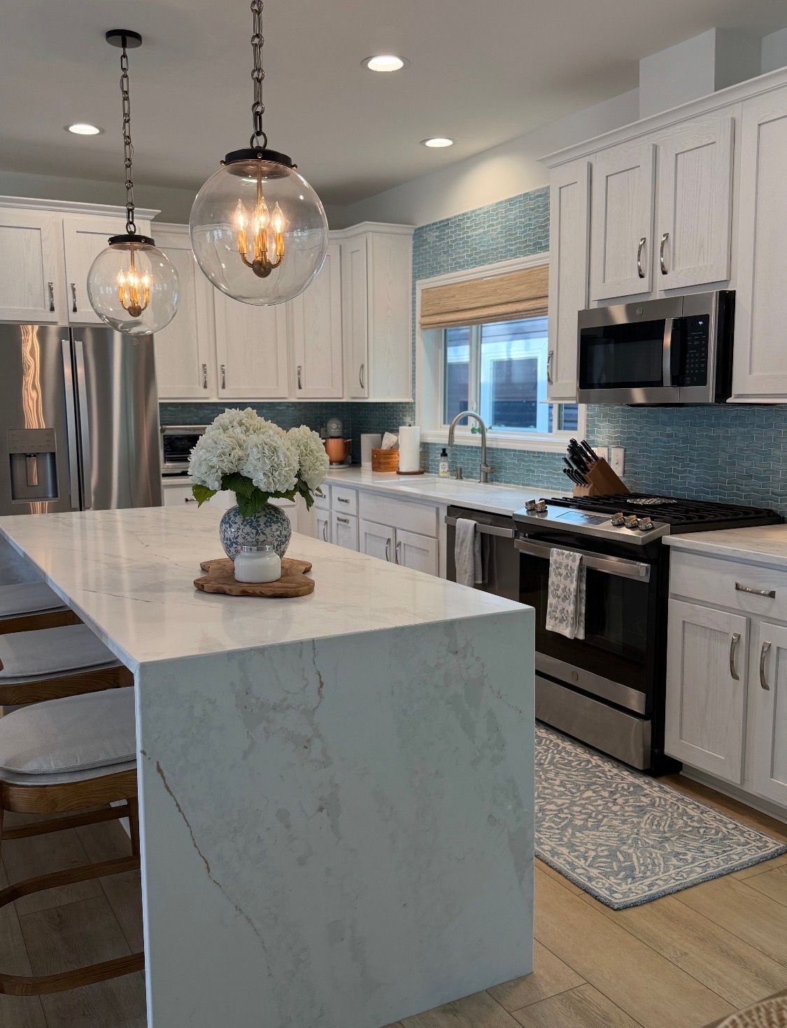 A large white marble slab is sitting on top of a wooden table.