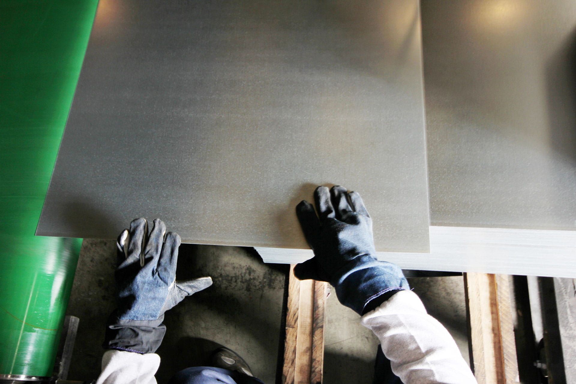 Precise handling of a metal workpiece during sheet metal fabrication.