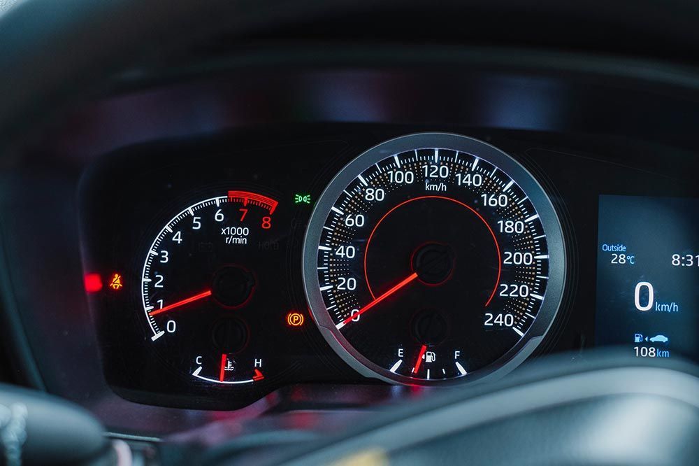 Close-Up Of Speedometer With Fuel Gauge In Car Close-Up Of Speedometer With Fuel Gauge In Car