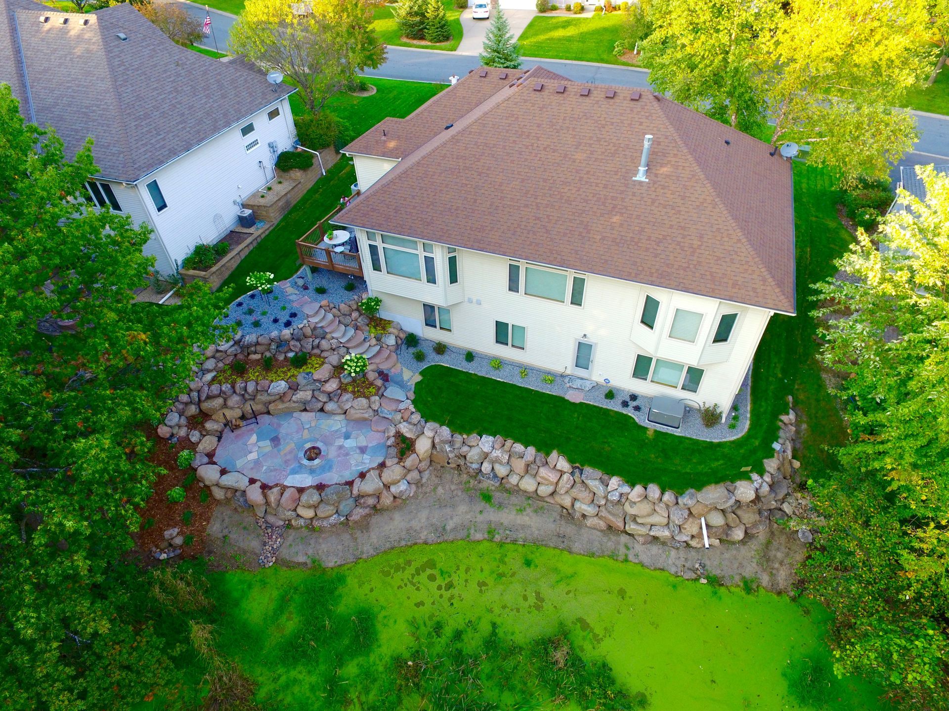 Boulder Retaining Wall | Whole Yard Landscape Design | Natural Stone Steps | Patio