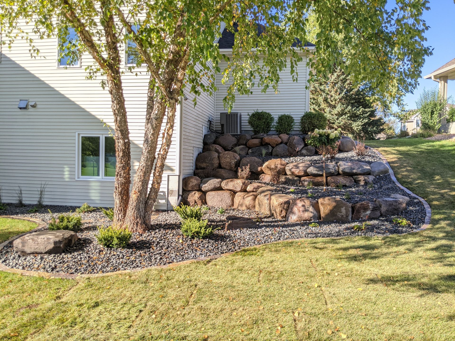 Natural Boulder Retaining Walls | Natural Stone Edging | Rock Mulch | Landscape Design