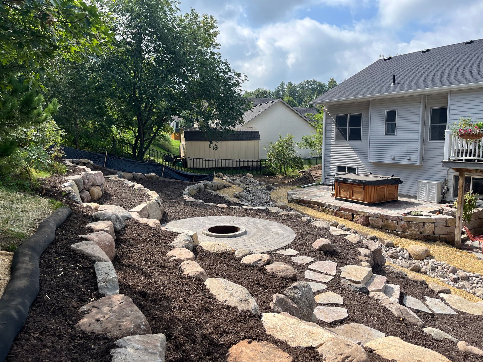 Boulder Retaining Walls | Stone Steppers | Paver Patio & Fire pit | Dry Creek Bed | Mulch