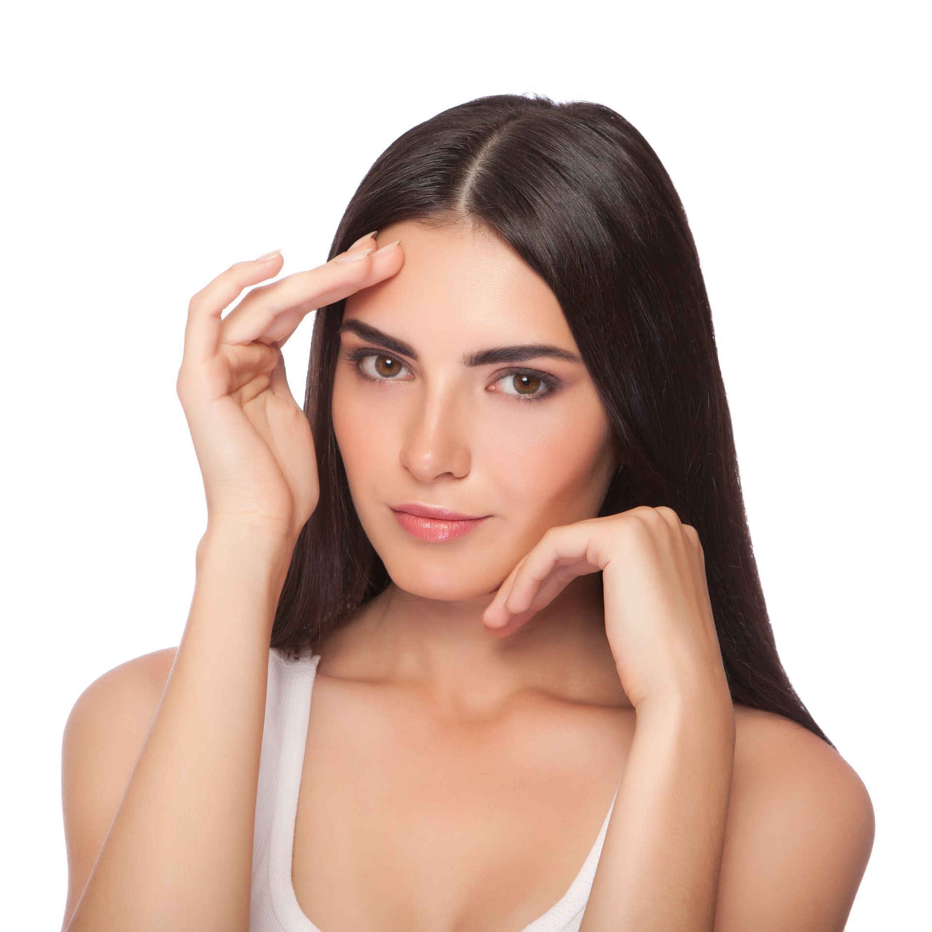 Portrait of a woman with long dark hair, resting her chin on her hand against a white background