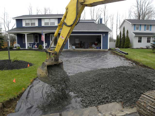 Filling The Driveway — Syracuse, NY — Dependable Paving Co., Inc.