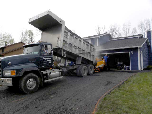 Truck Pouring Asphalt — Syracuse, NY — Dependable Paving Co., Inc.