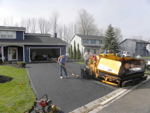 Spreading Asphalt — Syracuse, NY — Dependable Paving Co., Inc.