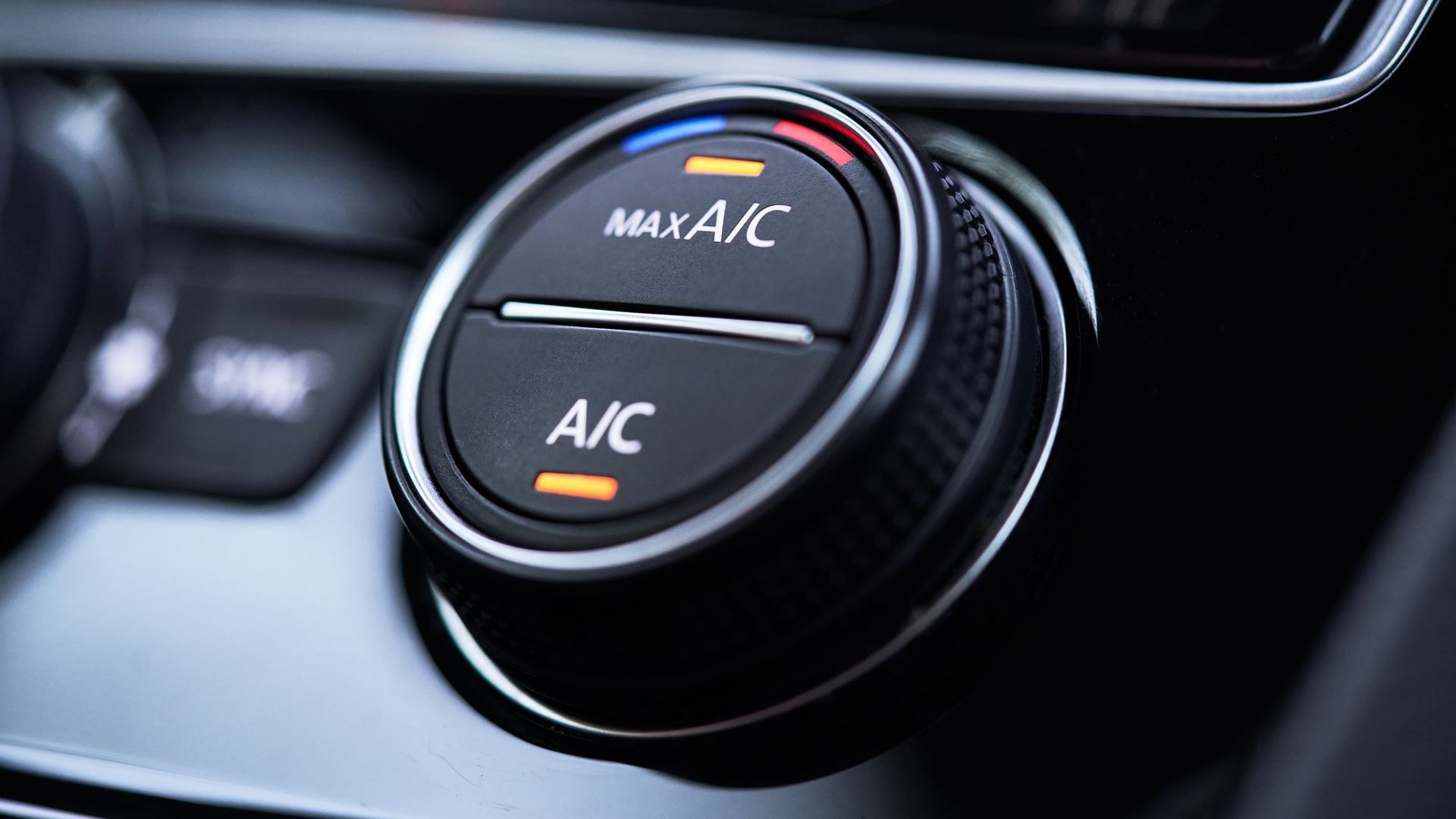AC dial on car showing the AC is on maximum