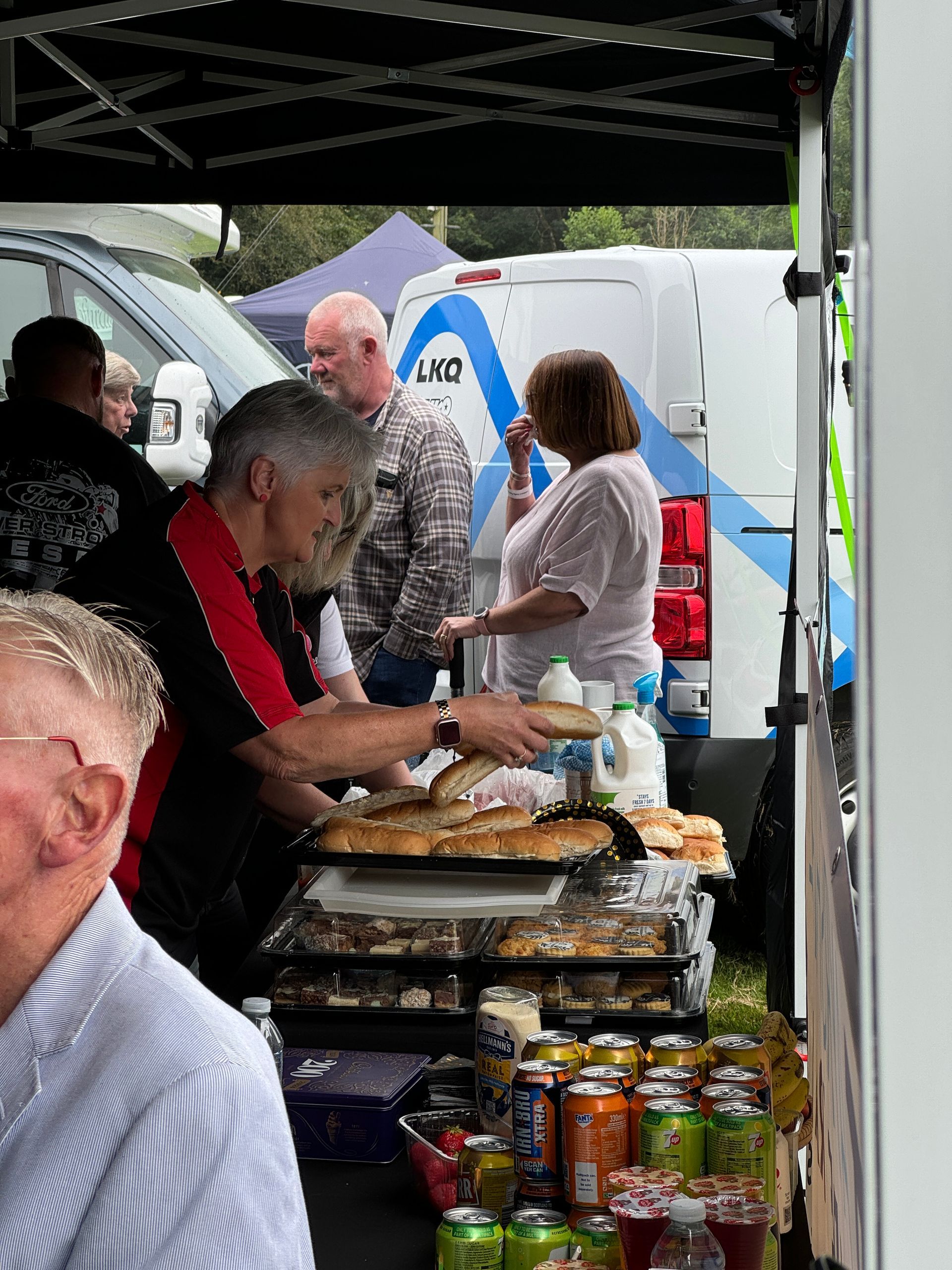AD Autocare team prepping food for festival goers