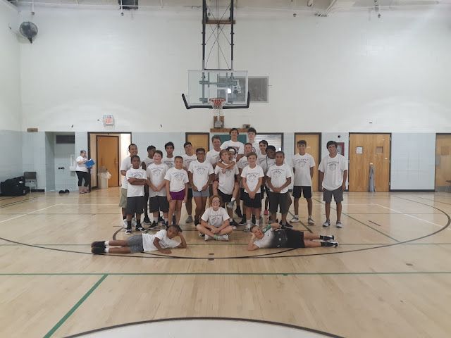 High Resolution photo needed Youth participants in the Creative Writing and Basketball Summer Program on a basketball court in Pottstown PA