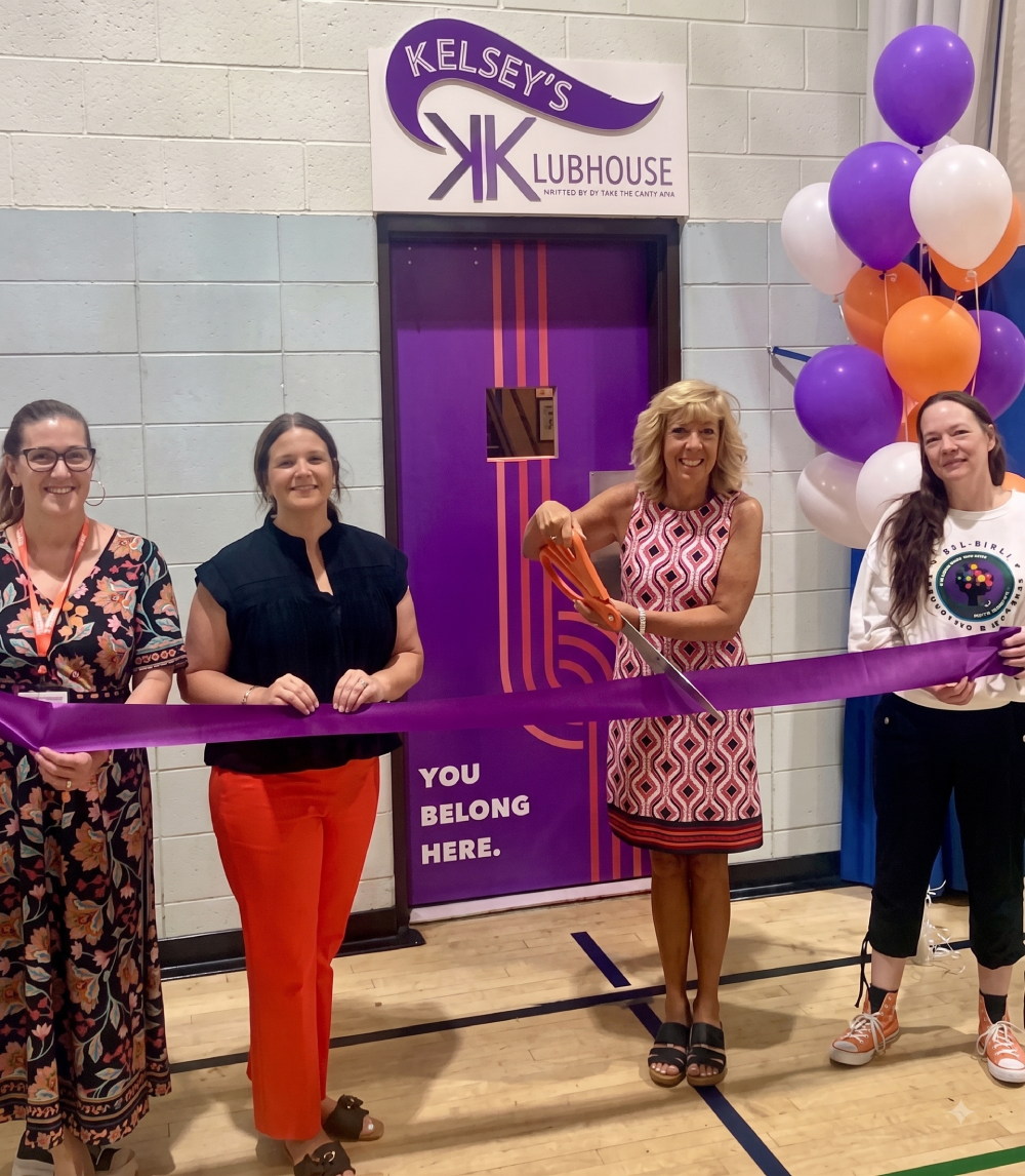 Lori Kramer and YWCA leaders celebrate the ribbon cutting grand opening of Kelsey's Klubhouse 2026