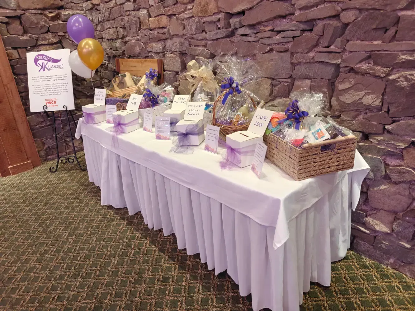 Raffle prize baskets including Oak Island, Cape May, Italian Date Night, and Spa Day at Kelsey's Gala 2026