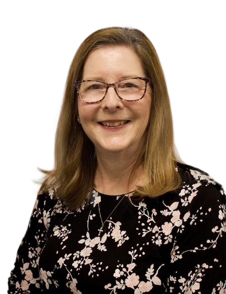 Smiling person with glasses wearing a black floral top on a white background
