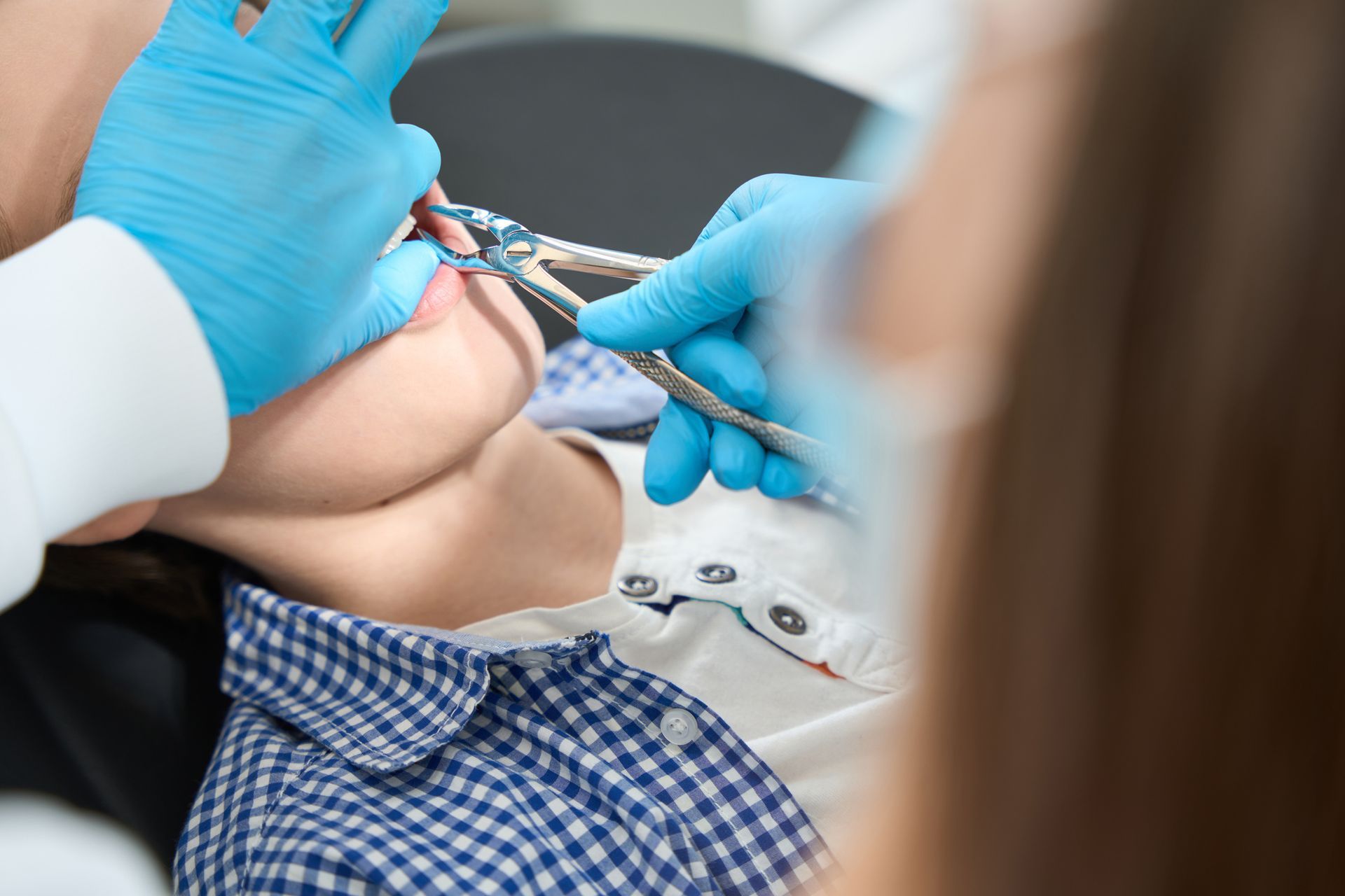 Kid Undergoing Tooth Extraction | Tooth Removal