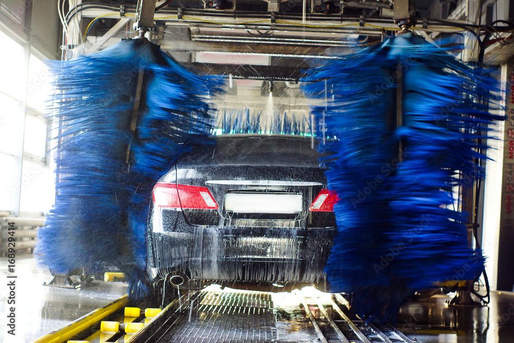 automatic car wash, black car