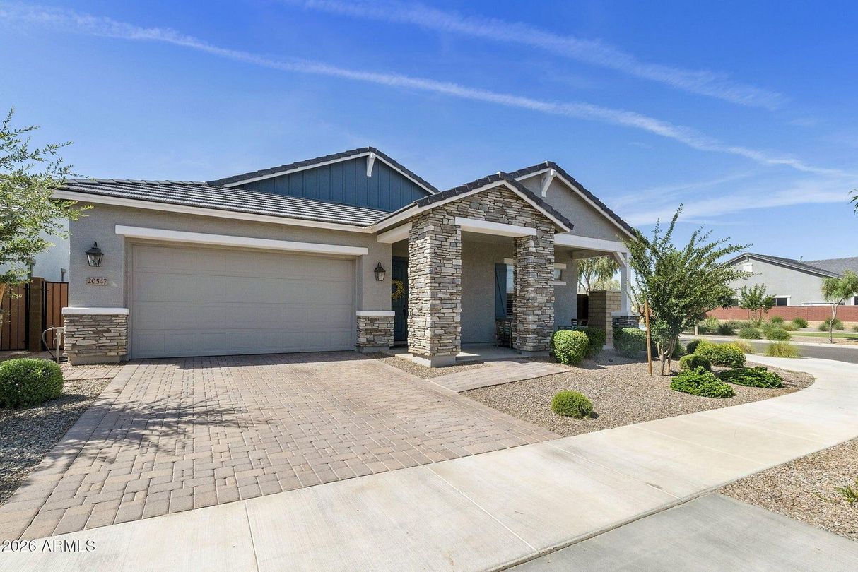 Front exterior of 20547 E Via De Colina, Queen Creek AZ, corner cul-de-sac lot with mountain views