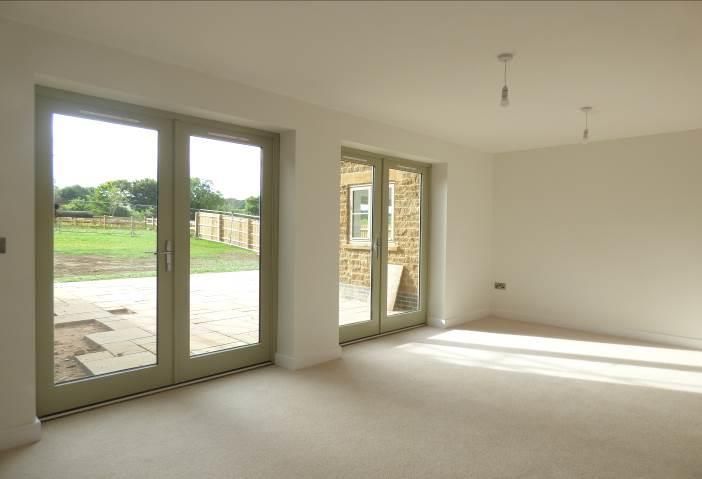 Brailes, An empty room with a lot of windows and doors.