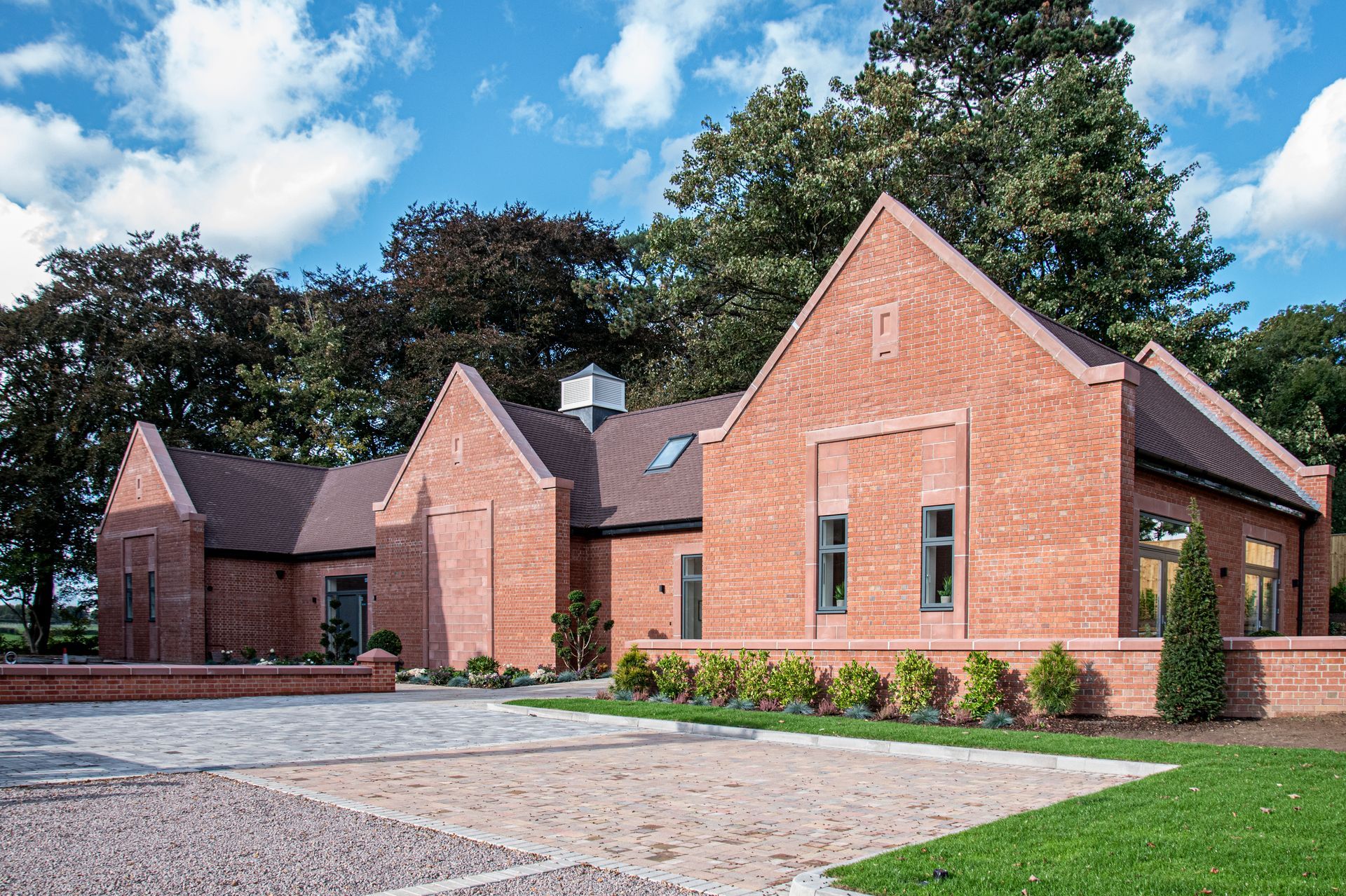 Milverton Hall, A large red brick house with a driveway in front of it