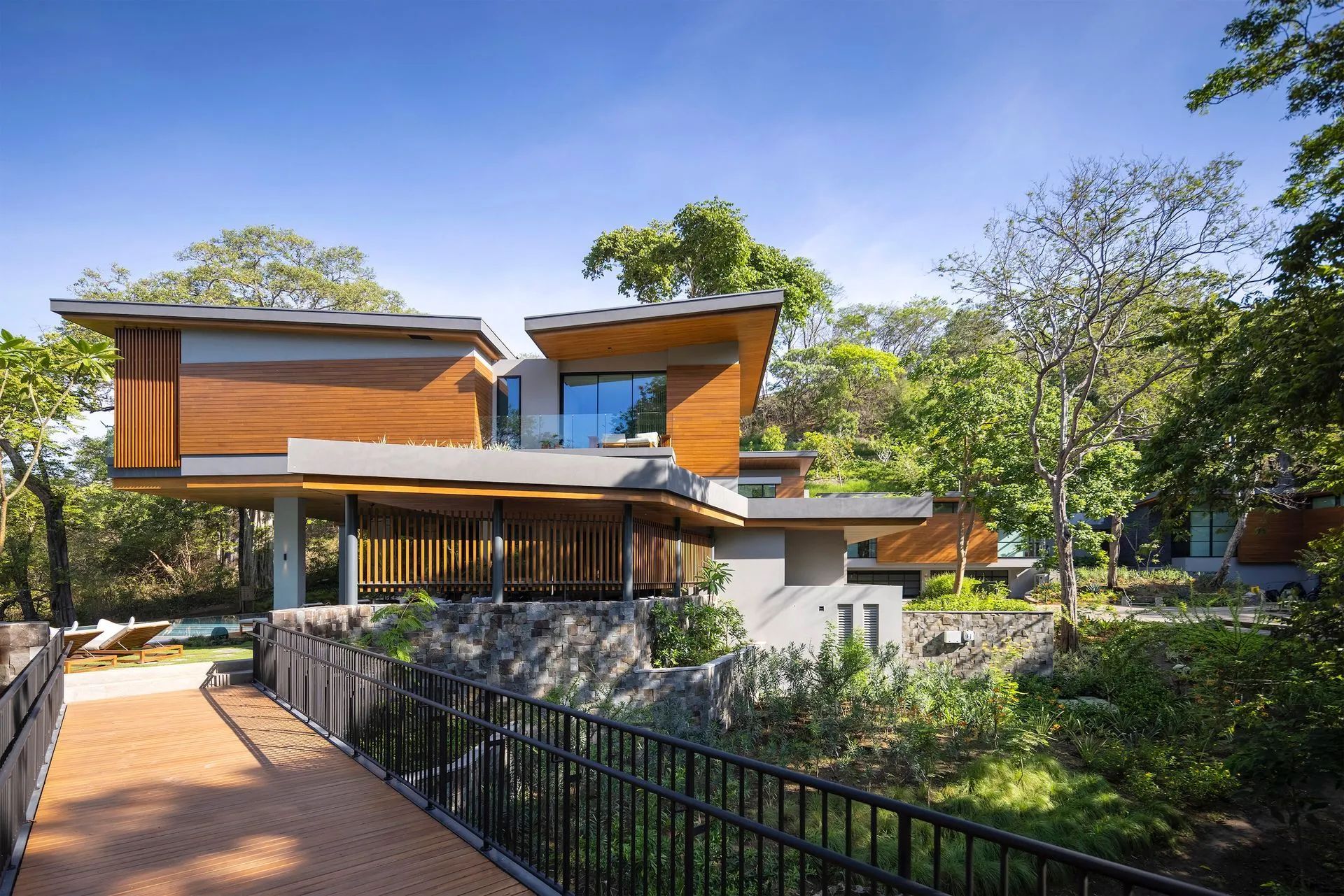 Villa Avellana main bridge, house appearing to float over the social areas on cantilevers.