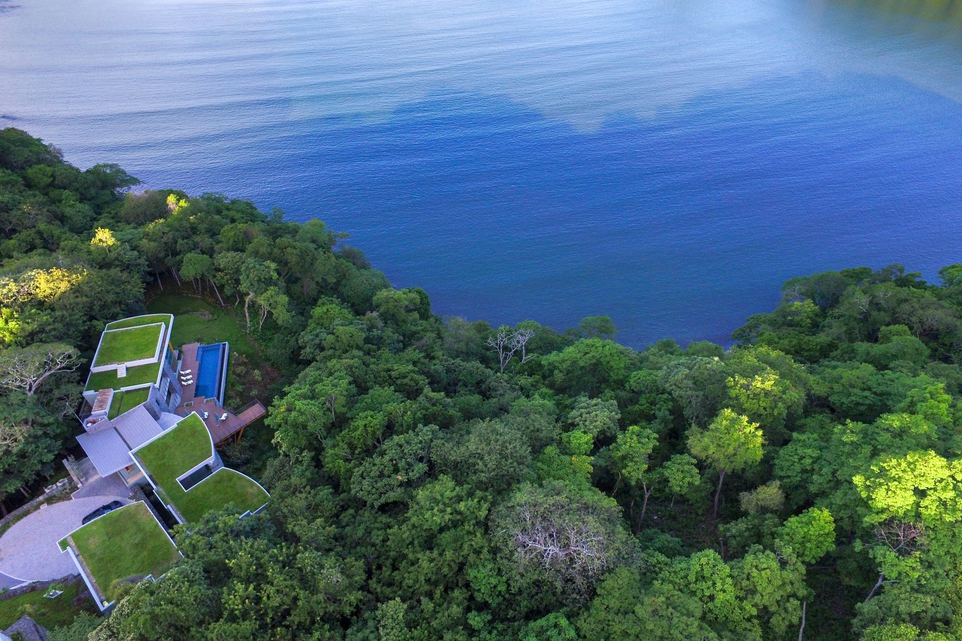 An aerial view of a Sarco house pointing to the ocean