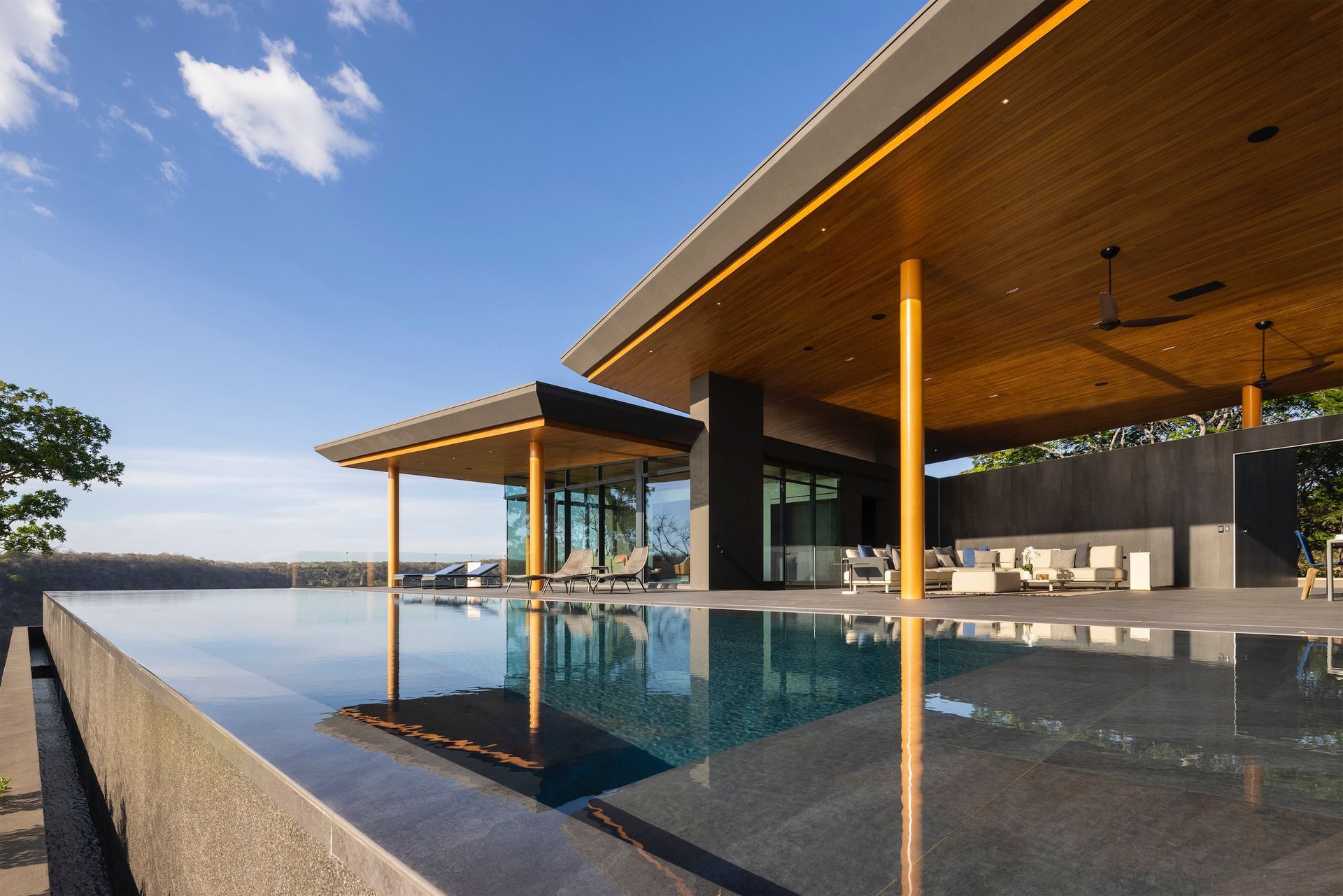 a large house with a swimming pool in front of it - casa aramara by sarco