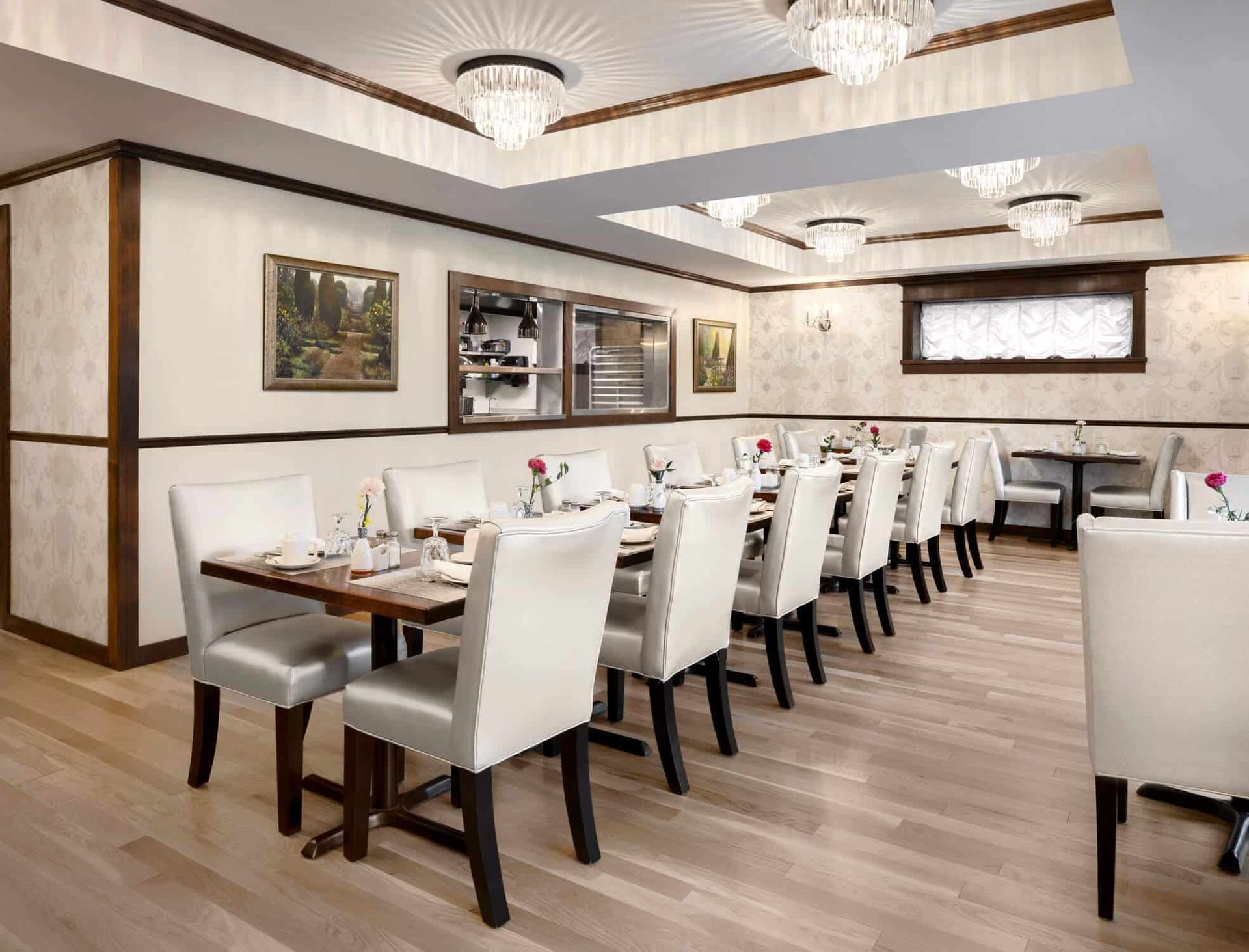 There are many tables and chairs in this restaurant.