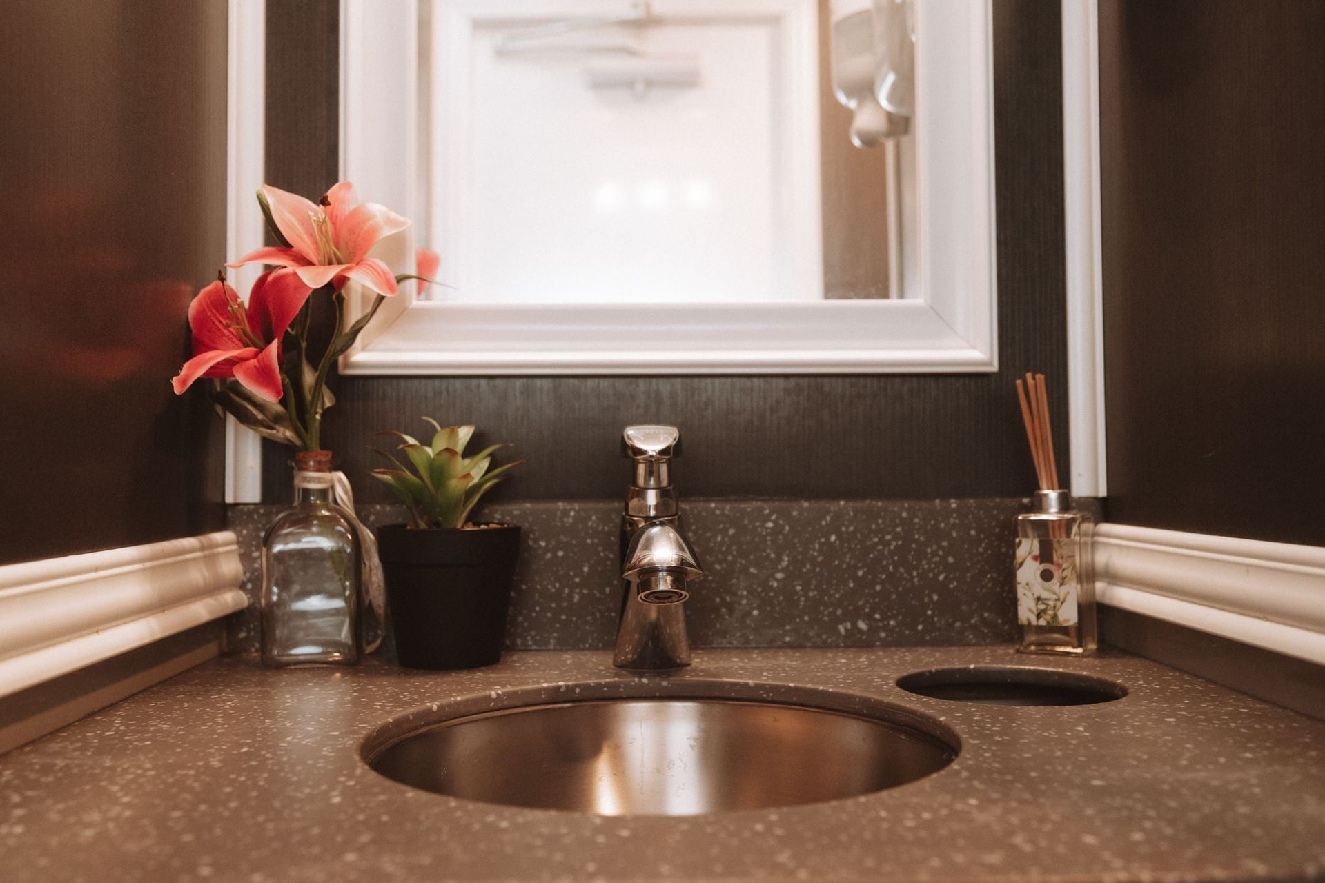 A Restroom is Parked in a Parking Lot — Absoloo Hire Pty Ltd in Morisset, NSW