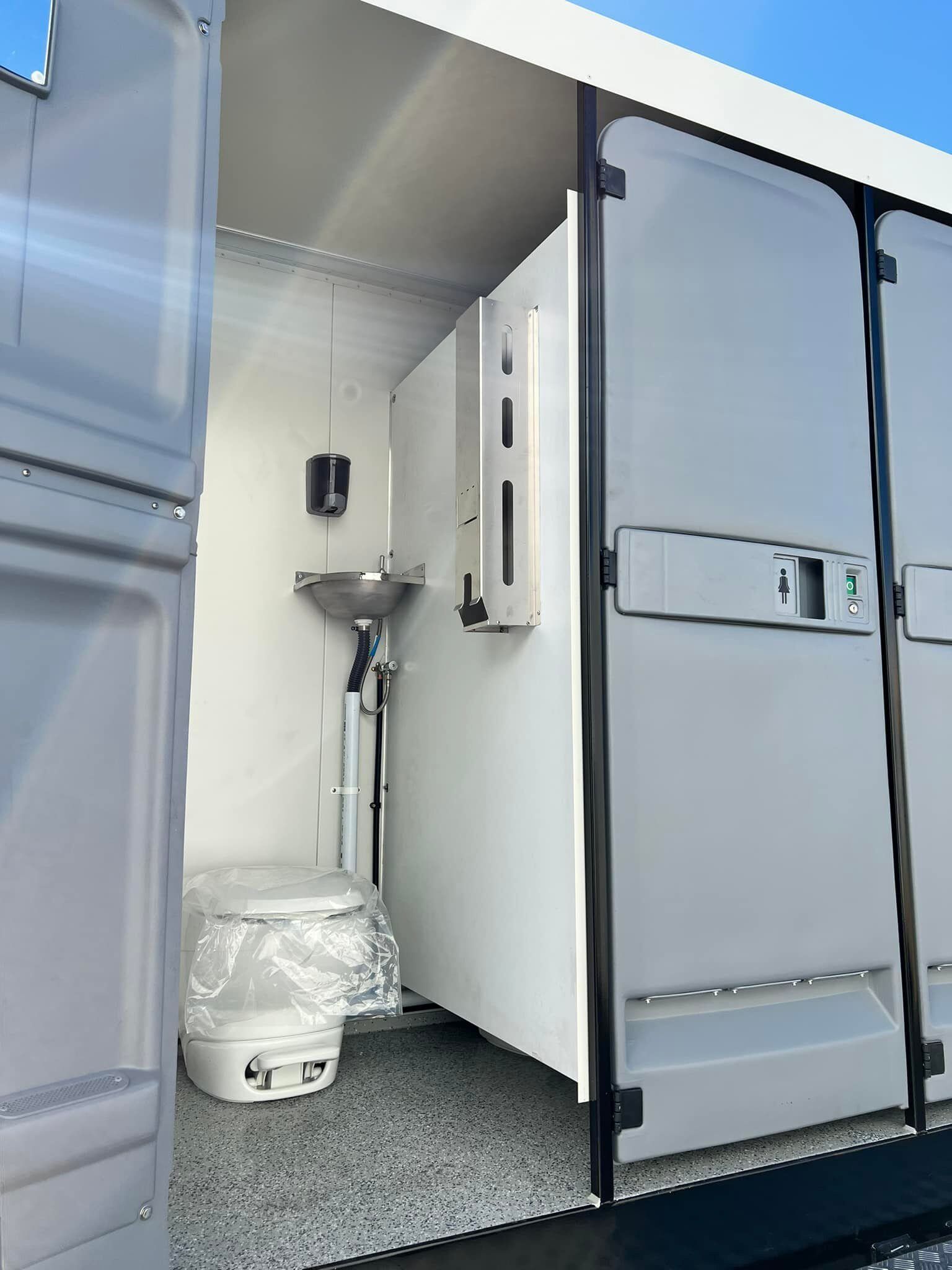 A Portable Toilet With a Sink — Absoloo Hire Pty Ltd in Coffs Harbour, NSW
