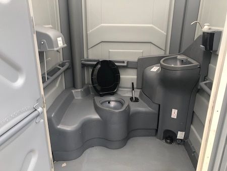 A Portable Toilet With a Sink — Absoloo Hire Pty Ltd in Taree, NSW