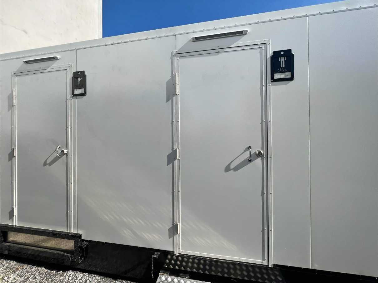 A Row of Toilet With a Sign on the Door — Absoloo Hire Pty Ltd in Forster, NSW