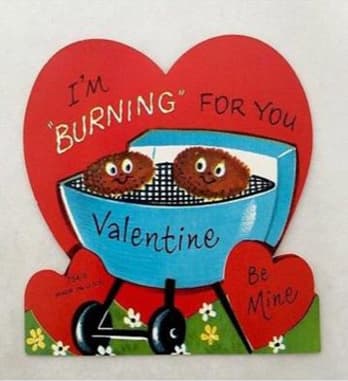 Image of a valentines card of two smiling burger patties on a grill reading