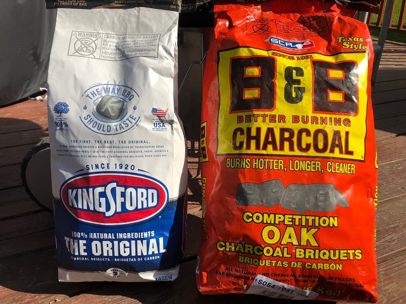 Bag of Kingsford Charcoal next to a bag of B&B Competition Briquets
