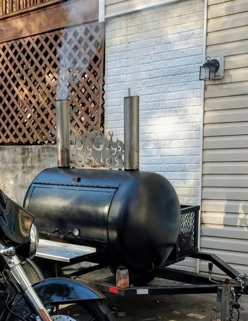 Large smoker closed with smoke coming out