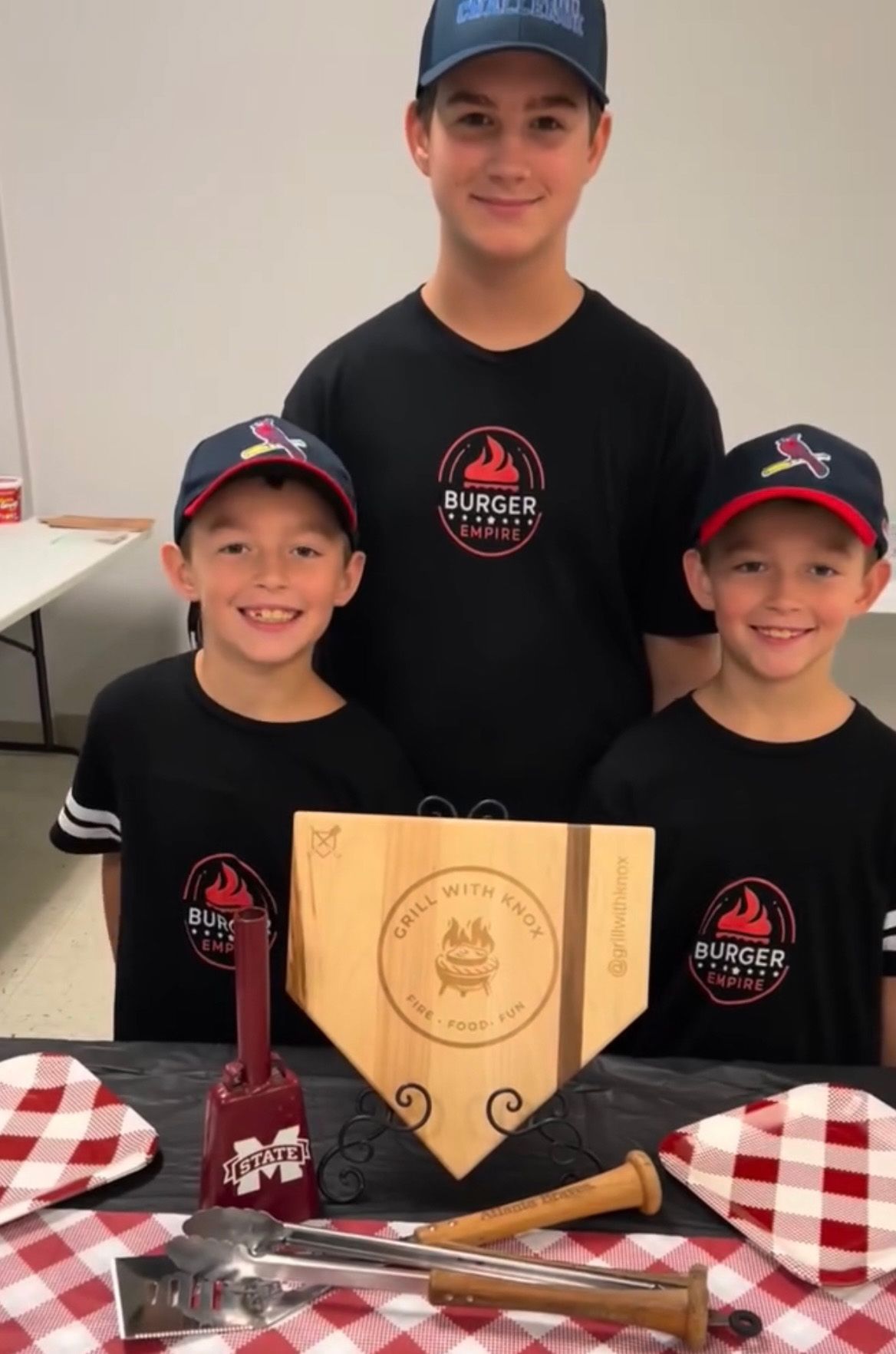 Knox Roundsaville Team B&B Future All Star and brothers with trophy