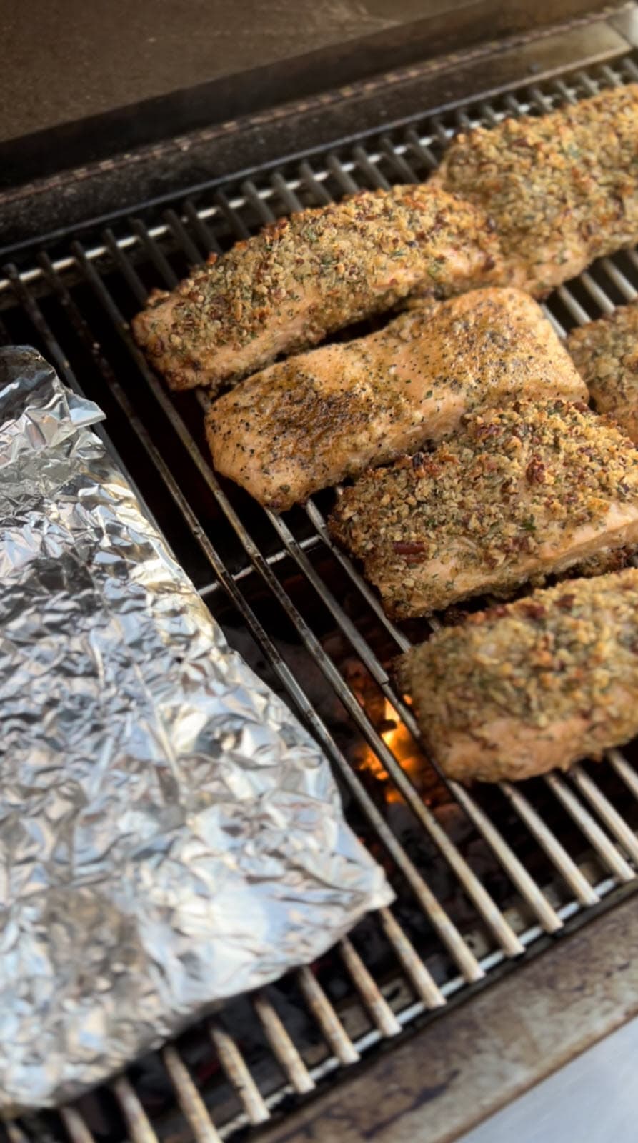 Salmon cooking on the grill