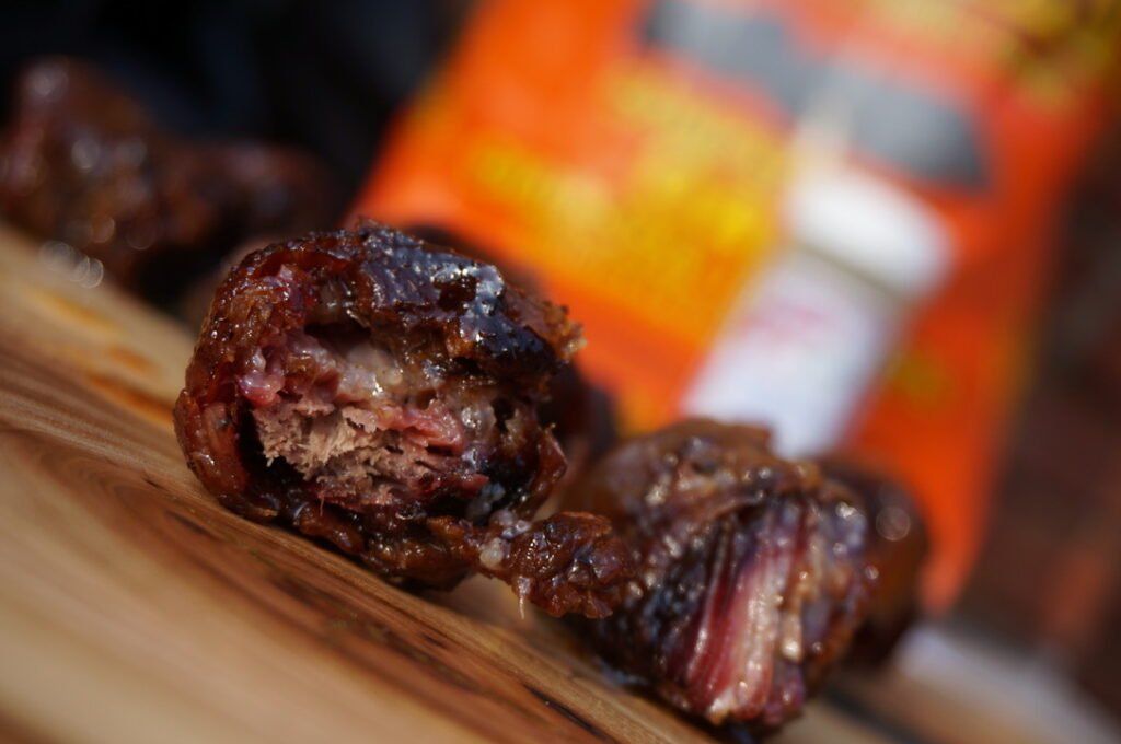 grilled beef bits with B&B Competition Oak Briquet Bag in background