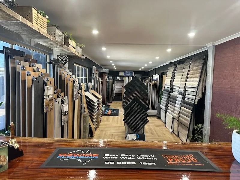 Interior of a Flooring Store Showcasing Various Tile and Wood Samples — Ozwide Flooring In Ciccone, NT