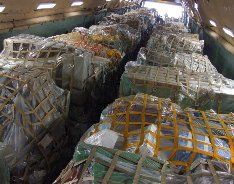 Cargo packed in netted bales inside an aircraft hold