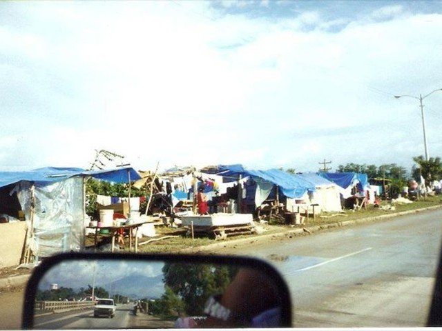A photo of how many in our world live without homes and only a tarp to call a roof. These are some of the areas in Honduras that received our Denton/Mission of Love Aid.