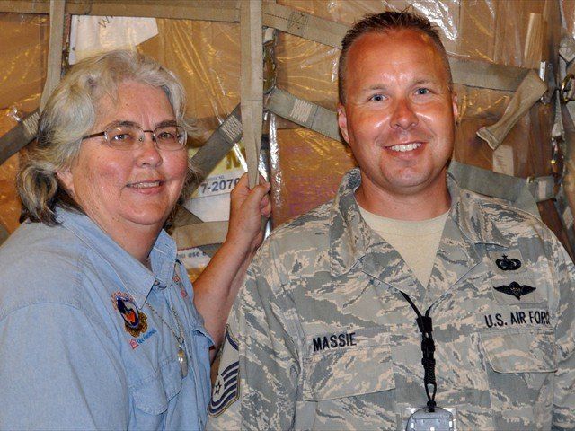 Kathy Price and Kevin Massie checking the humanitarian AID to be delivered on a C17 Denton Cargo Plane for the people of Honduras.