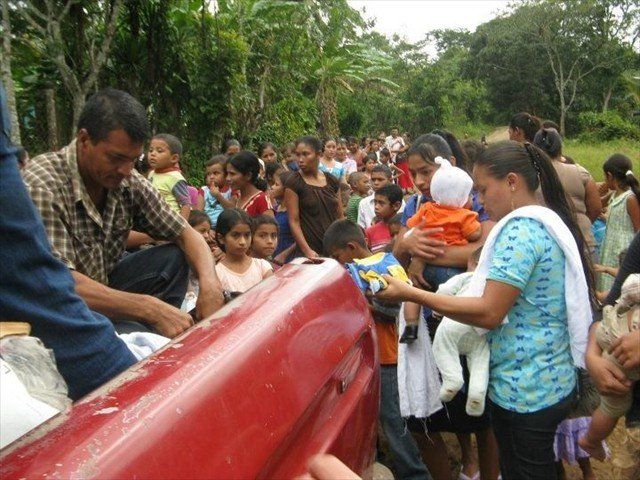 The Honduran Mom's are so happy with the donation of the children's clothes.