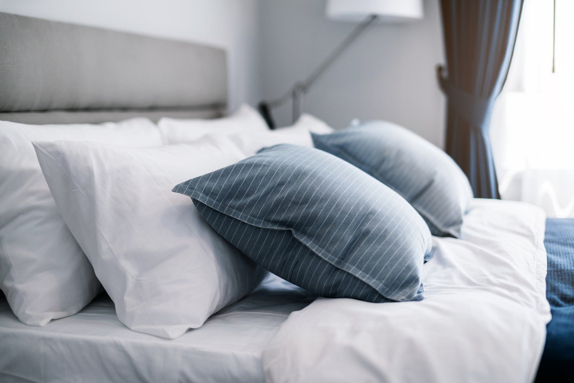 bed with pillows on it
