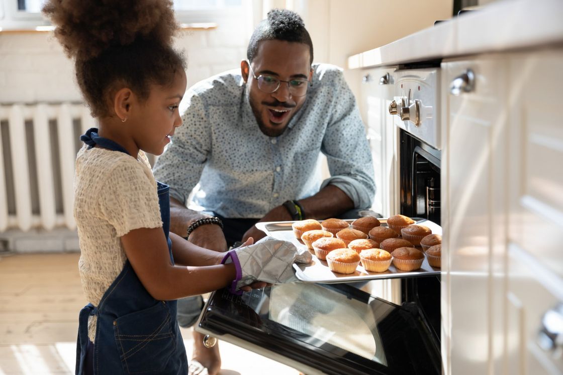 father and daughter baking