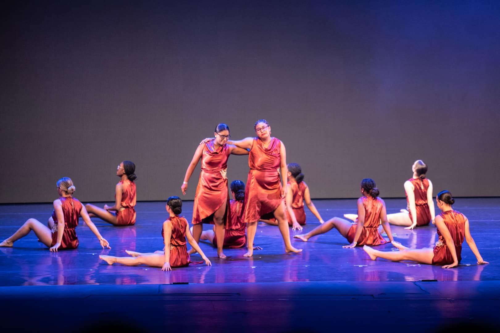 Teen dancers performing modern dance 