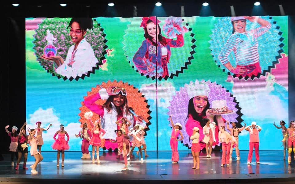 2024 dance showcase performance on stage with screens