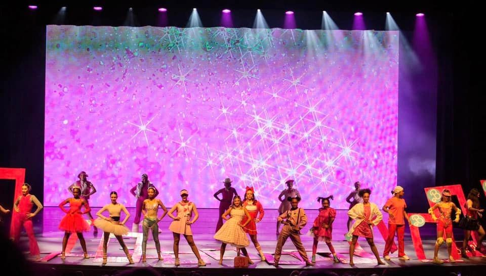 2024 dance showcase dancers posing on stage